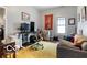 Living room with a work-from-home setup, a sofa and neutral paint at 1808 E 11Th St, Indianapolis, IN 46201