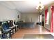 Spacious game room features hardwood floors, neutral walls, fireplace, and arcade games at 1831 Brook Crossing Way, Indianapolis, IN 46229