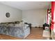 Cozy living room features hardwood floors, neutral walls, sectional sofa, and fireplace at 1831 Brook Crossing Way, Indianapolis, IN 46229