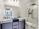 Modern bathroom with double vanity, and a frameless glass shower at 202 Mckim Ave, Indianapolis, IN 46201