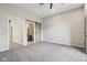 Spacious bedroom featuring a ceiling fan, neutral walls and carpet at 202 Mckim Ave, Indianapolis, IN 46201