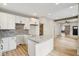 Open-concept kitchen with granite countertops and a center island at 202 Mckim Ave, Indianapolis, IN 46201