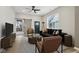 Stylishly furnished living room featuring modern décor, wood floors and sliding barn door at 202 Mckim Ave, Indianapolis, IN 46201