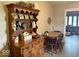Classic dining room featuring a wooden hutch and dining set, creating a warm atmosphere at 212 Vasbinder Dr, Chesterfield, IN 46017