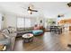 Spacious living room with comfortable seating, hardwood floors and an open concept floor plan at 2314 Walnut St, Anderson, IN 46016