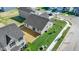 This property boasts a newly seeded lawn and landscaping as shown in this aerial view of the home and neighborhood at 2334 Black Rock Cir, Lebanon, IN 46052