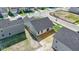 Aerial view of the property featuring newly installed grass, landscaping and nearby neighborhood in a suburban area at 2334 Black Rock Cir, Lebanon, IN 46052
