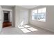 Bright bedroom with a window, carpeted floor, closet and view of an entry to another room at 2334 Black Rock Cir, Lebanon, IN 46052