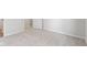 Neutral bedroom with a standard door and neutral carpet and paint at 2334 Black Rock Cir, Lebanon, IN 46052