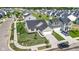 Lovely home with a blue front door, a two-car garage, a manicured lawn, and beautiful landscaping, creating a welcoming entrance at 2334 Black Rock Cir, Lebanon, IN 46052