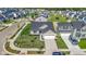 Beautiful home on a corner lot featuring a large driveway, attached two-car garage, mature trees, and meticulous landscaping at 2334 Black Rock Cir, Lebanon, IN 46052