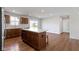 Bright kitchen featuring a breakfast bar and stainless appliances with convenient access to the living room at 2334 Black Rock Cir, Lebanon, IN 46052