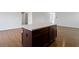 Close up of kitchen island, showing breakfast bar seating and conveniently located outlets for small appliances at 2334 Black Rock Cir, Lebanon, IN 46052