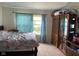 Comfortable bedroom with neutral carpet, closet, bright window, and storage at 2350 Harvest Moon Dr, Greenwood, IN 46143