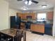 Functional kitchen with wood cabinets, modern appliances, and a spacious dining area at 2350 Harvest Moon Dr, Greenwood, IN 46143