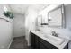 Bathroom featuring a granite vanity with double sinks, stainless steel fixtures, large mirrors and tile floors at 2628 Lamar Dr, Whitestown, IN 46075