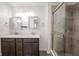 Modern bathroom features a double vanity and glass enclosed shower at 2628 Lamar Dr, Whitestown, IN 46075