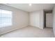 Bedroom features plush carpet, natural light, and closet at 2628 Lamar Dr, Whitestown, IN 46075
