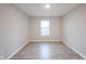 A bedroom with hard wood floors and a window at 2628 Lamar Dr, Whitestown, IN 46075