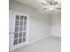 Bonus room with neutral carpet, French doors and ceiling fan at 2628 Lamar Dr, Whitestown, IN 46075