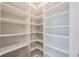 Interior walk-in closet boasts ample custom shelving at 2628 Lamar Dr, Whitestown, IN 46075