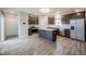 A spacious kitchen with stainless steel appliances and a center island at 2628 Lamar Dr, Whitestown, IN 46075