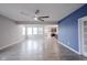 Open concept living room with wood floors, kitchen view, and lots of natural light at 2628 Lamar Dr, Whitestown, IN 46075