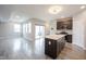 An open concept living area with large windows and a sliding glass door at 2628 Lamar Dr, Whitestown, IN 46075