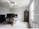 Bright office featuring a ceiling fan, a large monitor, and a book case at 2628 Lamar Dr, Whitestown, IN 46075