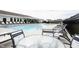 Community pool with lounge chairs and tables, perfect for relaxation and socializing at 2628 Lamar Dr, Whitestown, IN 46075