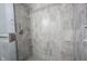 The bathroom features a glass shower with a tile surround, a rainfall shower head, and stainless steel fixtures at 2628 Lamar Dr, Whitestown, IN 46075