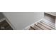 Angle view of white stairway and wooden floors at 2628 Lamar Dr, Whitestown, IN 46075