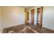 Bedroom with open closet and damaged floors needs renovation at 268 S Grant Ave, Indianapolis, IN 46201