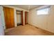 Bedroom with closet, window, carpet flooring and neutral paint at 268 S Grant Ave, Indianapolis, IN 46201