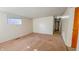 Living room with neutral walls, carpet flooring, and natural light from the window at 268 S Grant Ave, Indianapolis, IN 46201