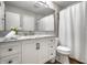 Bright bathroom featuring a marble countertop vanity, drawers, modern faucet, mirror, and white shower curtain at 2823 Somerset Bay, Indianapolis, IN 46240