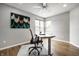 Bright office features neutral walls, hardwood floors, and lots of natural light from the large windows at 2823 Somerset Bay, Indianapolis, IN 46240