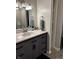 Bathroom featuring a vanity with storage and modern fixtures, creating a functional and stylish space at 2935 Flintwood Dr, Columbus, IN 47203