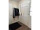 The entryway features doors, coat rack, and new flooring at 2935 Flintwood Dr, Columbus, IN 47203