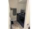 The laundry room offers a modern washer and dryer set, with a towel rack nearby at 2935 Flintwood Dr, Columbus, IN 47203
