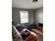 Relaxing living room features natural light and comfortable furniture, perfect for unwinding at 2935 Flintwood Dr, Columbus, IN 47203