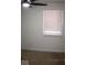 Bedroom with carpeted floor, bright window, and ceiling fan at 3008 W Grace Ln, Muncie, IN 47304