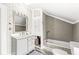 Bright bathroom with vanity, shower, and updated fixtures, for a modern and clean aesthetic at 315 W High St, Pendleton, IN 46064