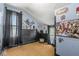 Eclectic bedroom with comic book decor, unique wall art, and window with black curtains, adding character at 315 W High St, Pendleton, IN 46064