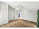 Bright bedroom with carpeted floors, closet, and natural light, ready for personalization and comfort at 315 W High St, Pendleton, IN 46064