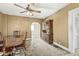 Elegant dining area with a wooden cabinet and carpet flooring, ideal for formal dinners and entertaining at 315 W High St, Pendleton, IN 46064
