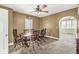 Cozy dining area featuring a wooden table set with chairs and carpet flooring, great for gatherings at 315 W High St, Pendleton, IN 46064