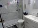Modern bathroom featuring a glass-enclosed shower and a stylish vanity with a grey and white marbled design at 3426 Ireland Dr, Indianapolis, IN 46235
