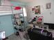 Bright bedroom showcasing a loft bed with a comfortable-looking top bunk and stylish decor at 3426 Ireland Dr, Indianapolis, IN 46235