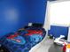 Brightly painted bedroom featuring a unique bed design at 3426 Ireland Dr, Indianapolis, IN 46235